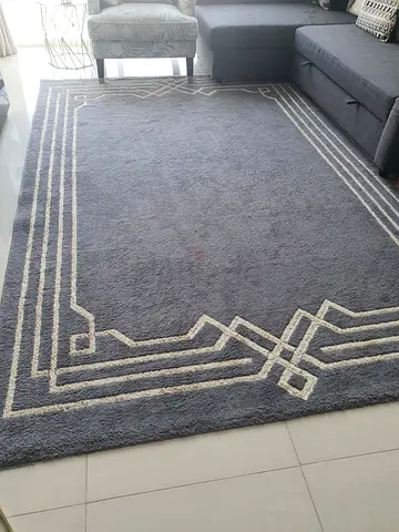 Grey geometric area rug - good condition, soft pile