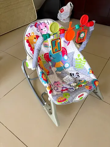Baby rocker / bouncer seat with toy bar - gently used