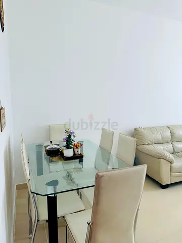 Glass Top Dining Table with 4 Cream Leather Chairs - Good Condition