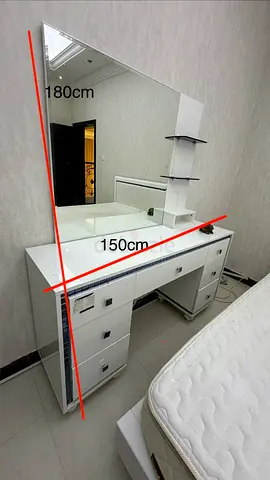 Bed with blanket and Dressing table