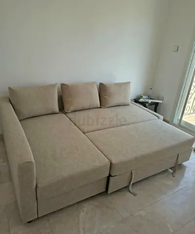 Ikea L Shape Sofa cum bed with big storage in L