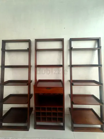 CRATE  BARREL Set of Three Wooden Display Shelves with Center Wine Rack and Drawer
