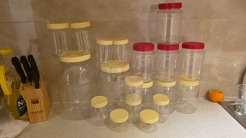 Set of Clear Plastic Storage Jars with Lids (Various Sizes)
