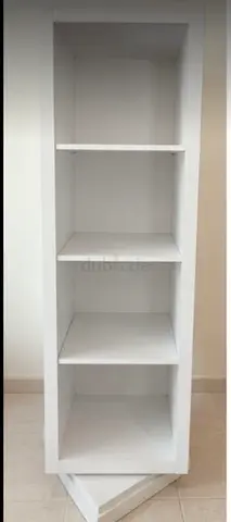 Rotating bookcase with mirror, pin wall and hangers