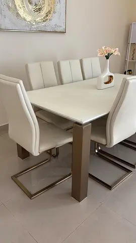 Modern white dining table with 8 cream leather chairs - good condition