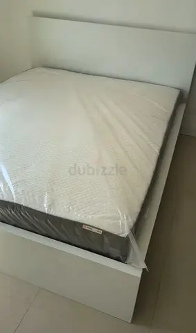 IKEA malam queen‑size bed (160 × 200 cm) with 2 storage drawers underneath and an IKEA mattress