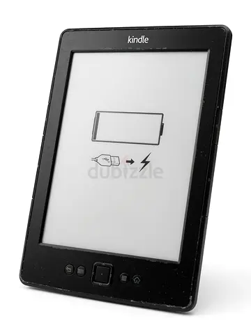 Amazon Kindle 4 (4th Generation) e-reader in fully working condition.
