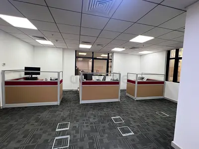 5 brown office desks, 3 chairs, 3 partitions