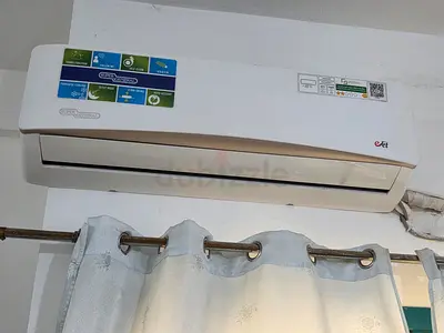 Wall-mounted split air conditioner -  less used, perfectly working condition with warranty