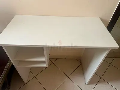 Compact white study desk with shelving — good condition