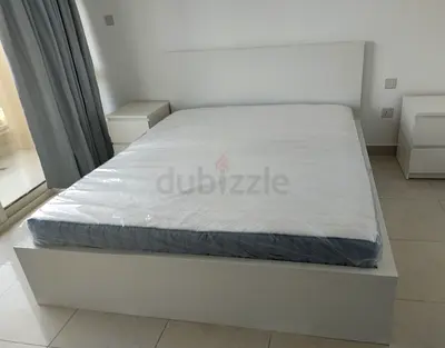 IKEA malam queen‑size bed (160 × 200 cm) with 2 storage drawers underneath and an IKEA mattress ✨