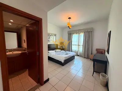 Furnished 2BR Apartment | Balcony & Parking