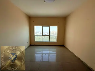 Two bedrooms and a living room in Abu Shagara for annual rent, open view, free parking