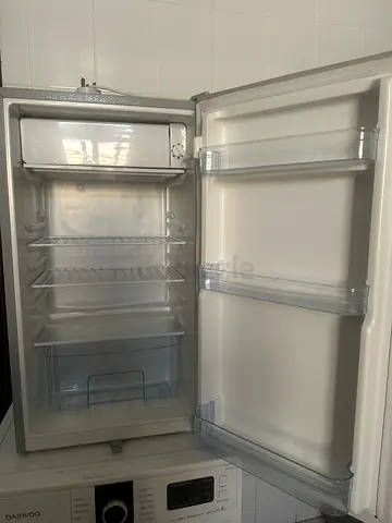 Single-door upright refrigerator in good working condition
