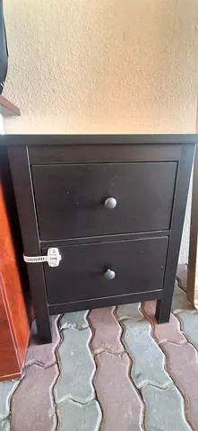Dark wood bedside cabinet / nightstand with two doors