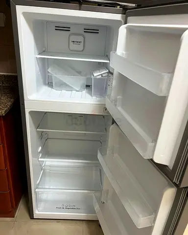 Compact top-freezer refrigerator – clean, working condition