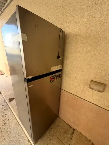 Used two-door refrigerator - good working condition