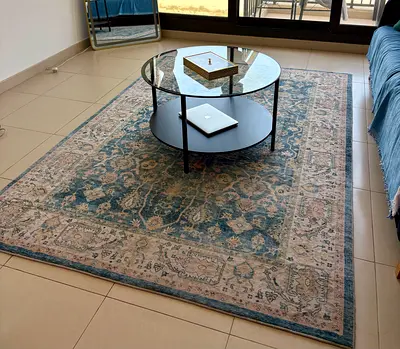 Middle Eastern style blue and beige patterned area rug
