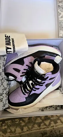A brand new womens sneakers (lavender  black) in box - size available 40