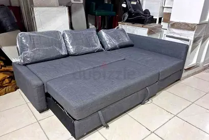 Ikea L shape sofa store cum bed and you can fix the