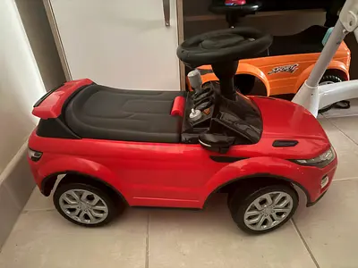 Red Ride-On Toy Car for Toddlers - Good Condition