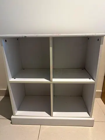 Shoe rack or storage unit.
