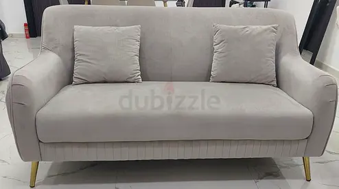 Light grey 3 and 2-seater sofa with gold legs - gently used