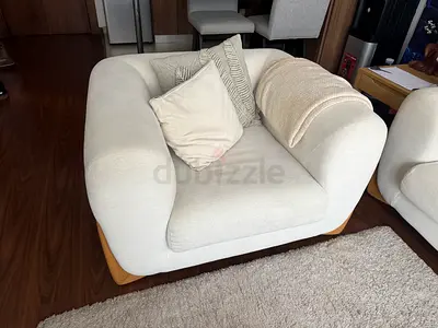 Large Cream Fabric Armchair with Wooden Base - Good Condition
