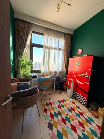 Kids bedroom set - colorful rug and Cars-themed wardrobe included