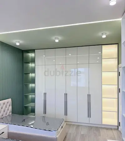 Built-in High Gloss White Wardrobe with Open Shelves and Lighting