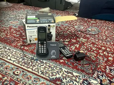 Panasonic home phone with one extra phone and line cable
