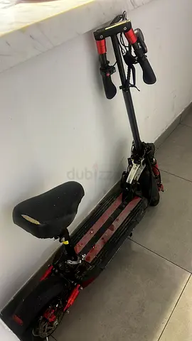 Used electric scooter with foldable seat - runs, needs minor repairs