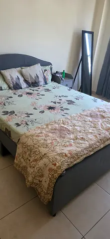 Queen Size Bed with Headboard and Mattress - Good Condition with side tables.