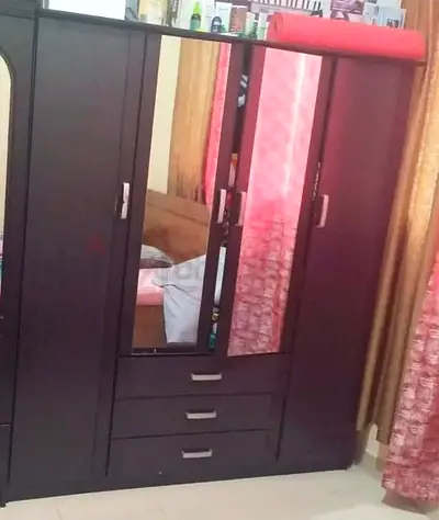 Dark wood 4-door wardrobe with mirror and drawers - good condition