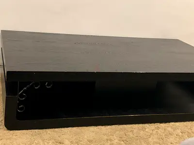 Low modern black wooden coffee table with storage