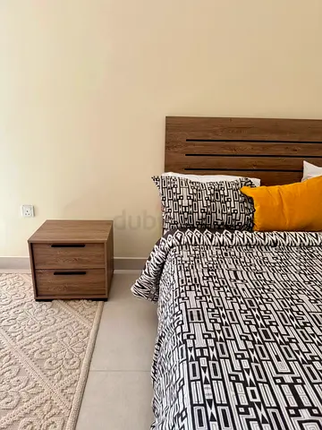 Queen bed and side table with mattress