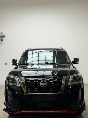Nissan Patrol LE T2 2017 GCC Specs Paint changed from white converted to Nismo 2023