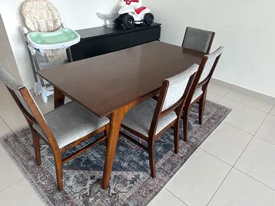 Wooden dining table with 6 upholstered chairs - good condition