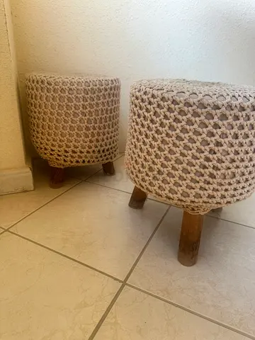Pair of woven macrame round stools/ottomans with wooden legs