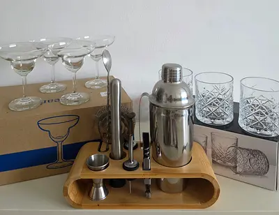 Complete cocktail shaker set with glasses and bamboo stand