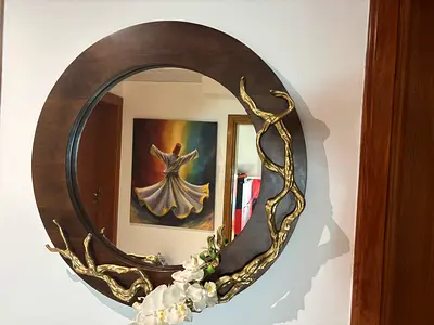 Round Wooden Wall Mirror with Decorative Gold Branch Accents