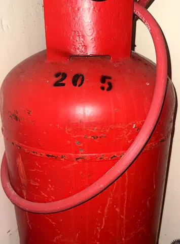 Used Red Gas Cylinder with cooker top - Good Condition