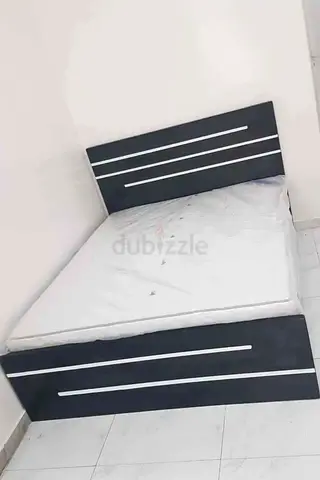 Queen bed frame with mattress included - modern black design