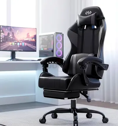 Ergonomic Black Gaming/Office Chair with Footrest and Lumbar Pillow Massage