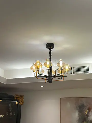 Modern vintage-style chandelier with multiple glass bulbs - excellent condition