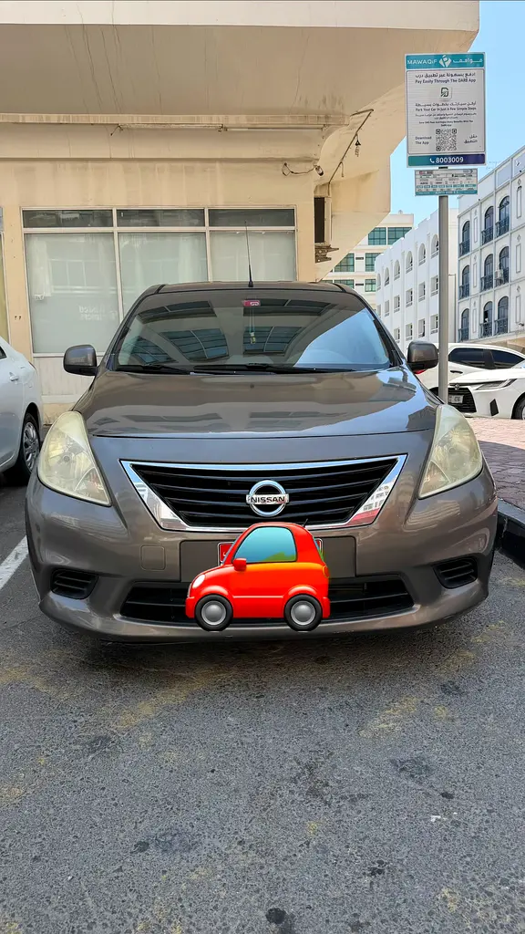 Nissan Sunny 2012 — photo 1 of 6