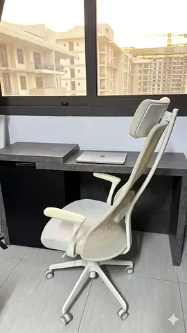Ergonomic white mesh office chair with headrest