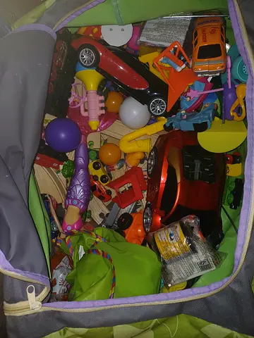 Box full of Toys and puzzle and wooden train