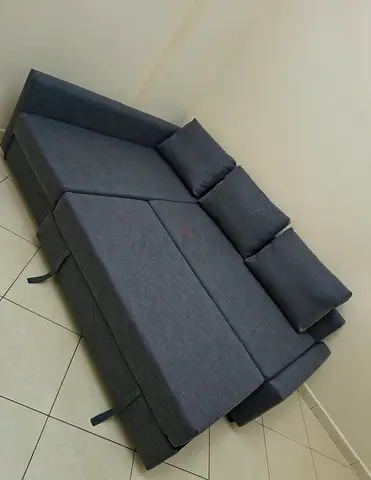 Ikea L Shape Sofa cum bed with big storage in L