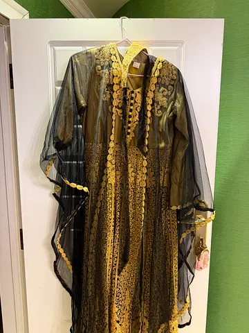 Black sheer abaya with gold embroidery and sequins